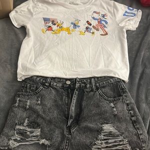 Vintage Disney shirt and black jean shorts